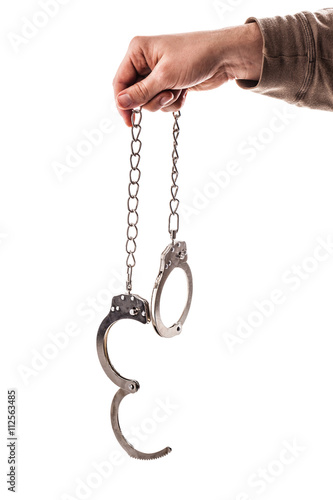 holding cuffs on white