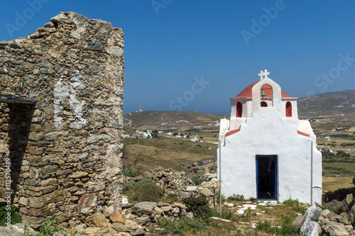 The ruins of a medieval fortress and White church  Mykonos island  Cyclades  Greece