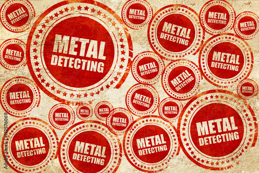 metal detecting, red stamp on a grunge paper texture metal detecting, red stamp on a grunge paper texture
