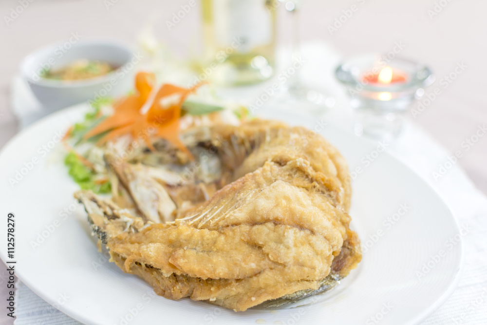 deep snapper fried with fish sauce the delicious favorite menu Thai seafood. deep snapper fried with fish sauce the delicious favorite menu Thai seafood.