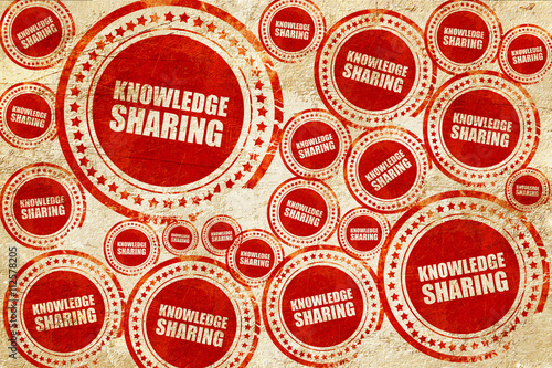 knowledge sharing, red stamp on a grunge paper texture