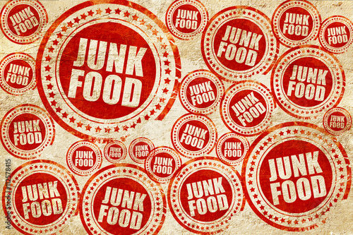 junk food  red stamp on a grunge paper texture