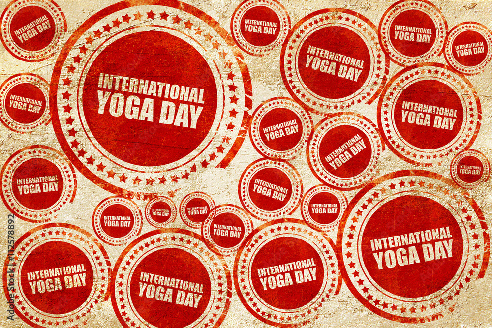 international yoga day, red stamp on a grunge paper texture