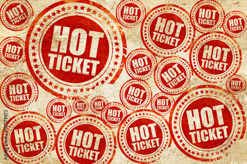 hot ticket  red stamp on a grunge paper texture