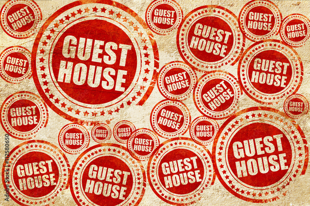 guesthouse, red stamp on a grunge paper texture