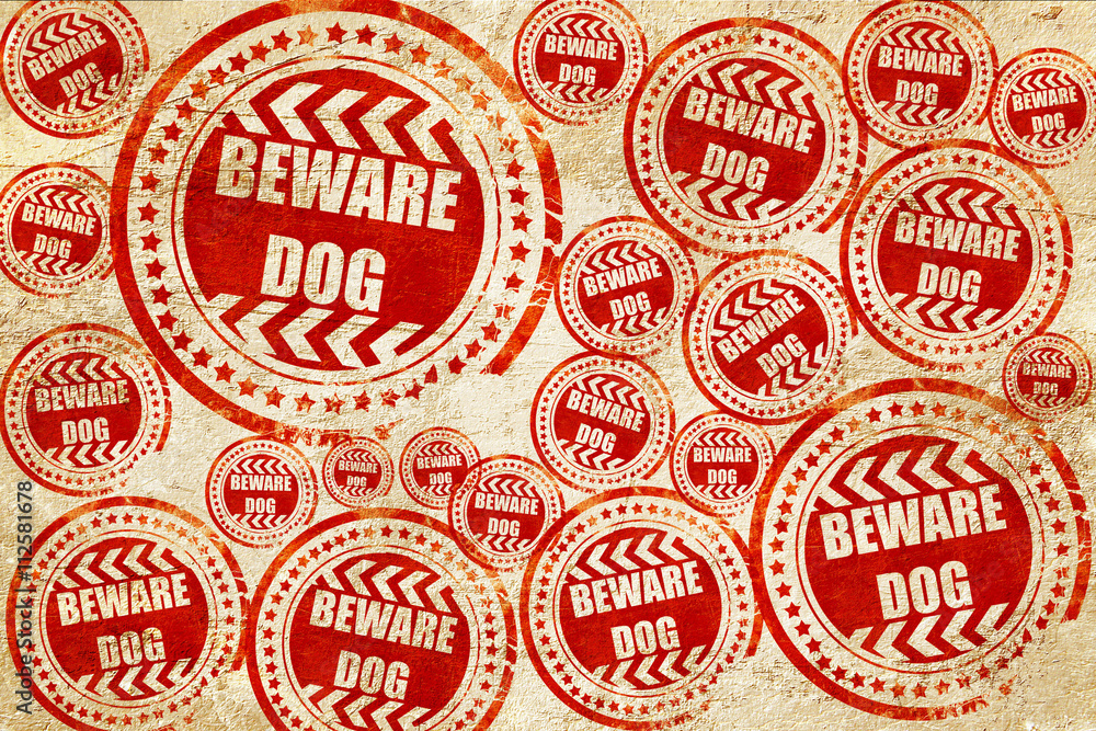 Beware of dog sign, red stamp on a grunge paper texture