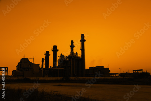 Gas turbine electrical power plant at dusk © mathisa