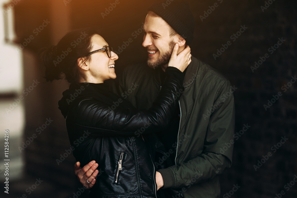 couple posing in backstreet couple posing in backstreet