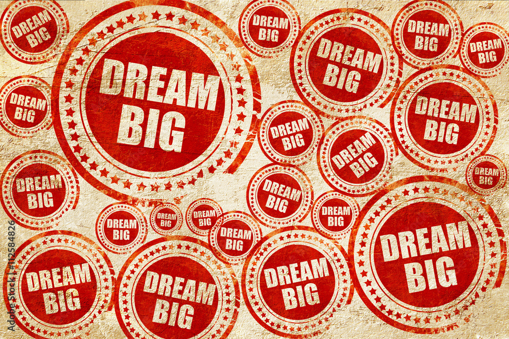 dream big, red stamp on a grunge paper texture