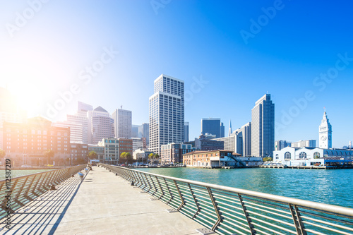 empty footpath on bridge with cityscape and skyline of portland