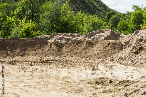 Small sand pit. The ecological problem of small towns. Soil erosion and the destruction of parks. Volgograd city.