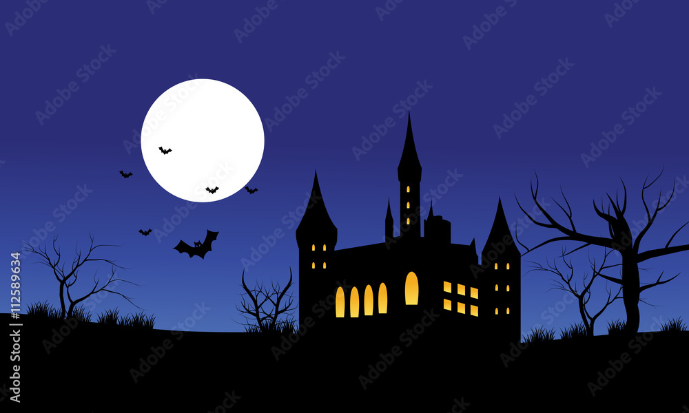 Silhouette of castle Halloween and full moon
