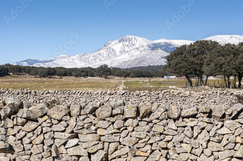 Views of Guadarrama Mountains, In Madrid Province, Spain. It can be seen La Maliciosa Peak and Bola del Mundo Peak. photo