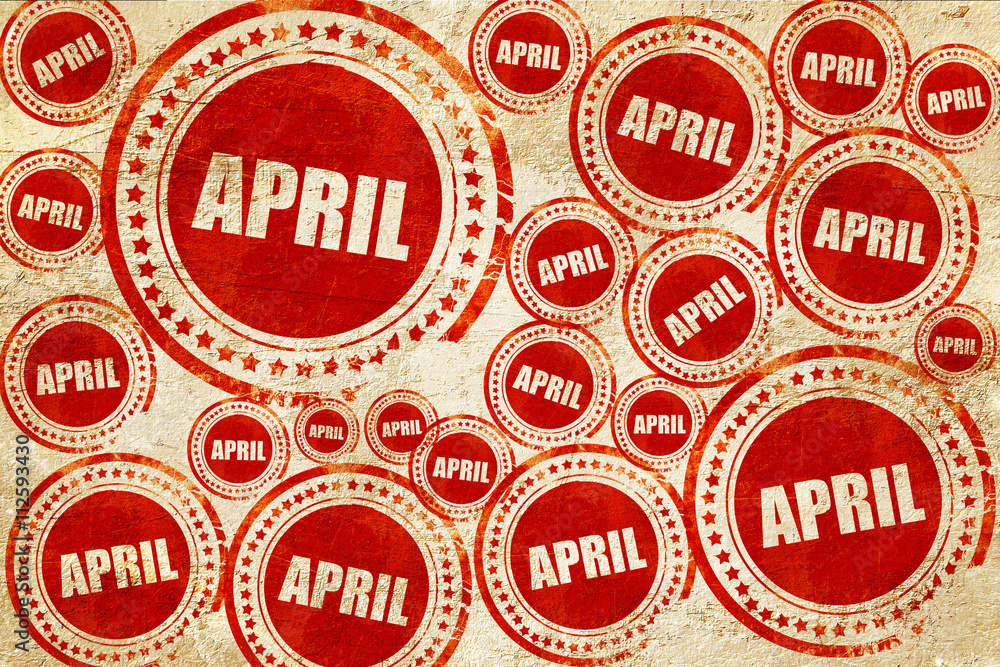 april, red stamp on a grunge paper texture