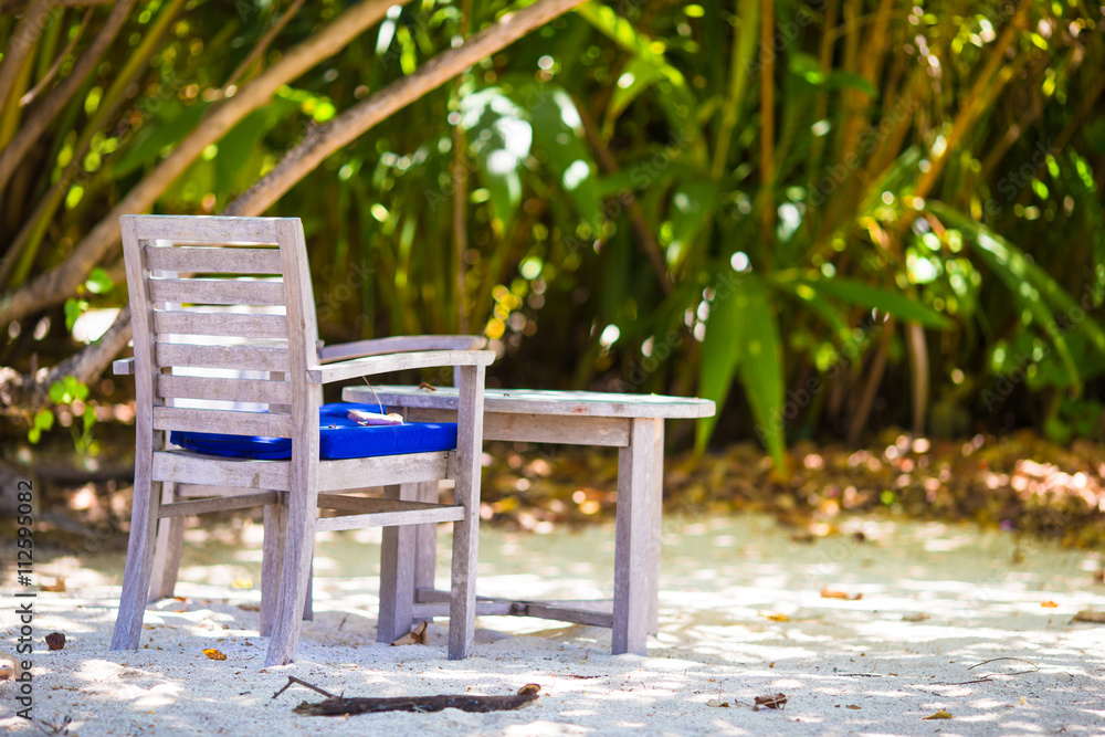 Summer empty outdoor cafe at exotic island in indian ocean Summer empty outdoor cafe at exotic island in indian ocean