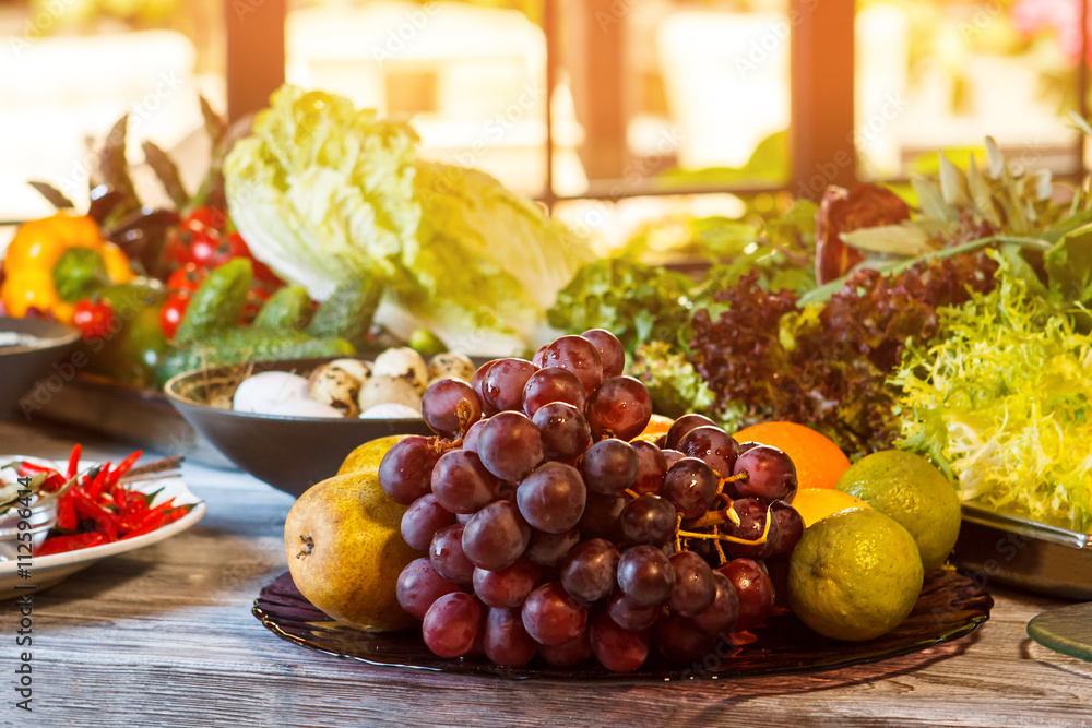 Grape and lime on plate. Lots of fruits and vegetables. Sweet and juicy. Eat till you drop. Grape and lime on plate. Lots of fruits and vegetables. Sweet and juicy. Eat till you drop.