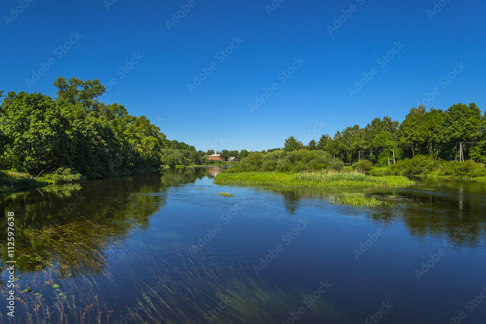 Summer solar landscape;,  river and blue sky