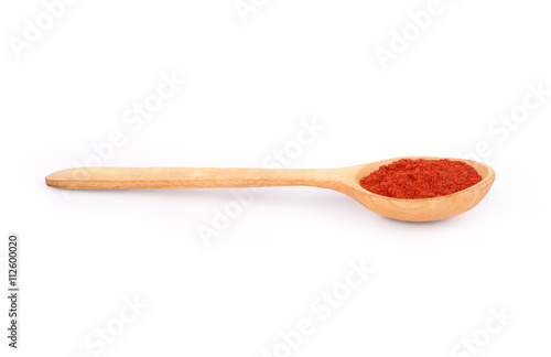 sumac powder spices on spoons isolated on a white background