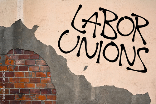 Vászonkép Labor / Trade union - Handwritten graffiti sprayed on the wall, anarchist aesthetics