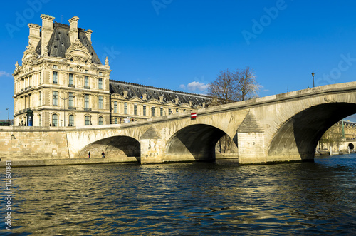 Louvre Museum in Paris from the Seine river