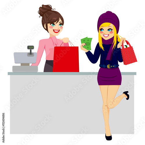 Young beautiful blonde woman paying purchase with cash while store clerk is preparing shopping bag