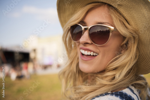 Cheerful blonde spending time outdoors