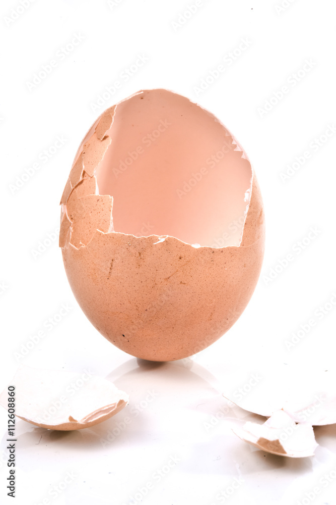 a cracked eggshell, broken eggshell on white background a cracked eggshell, broken eggshell on white background