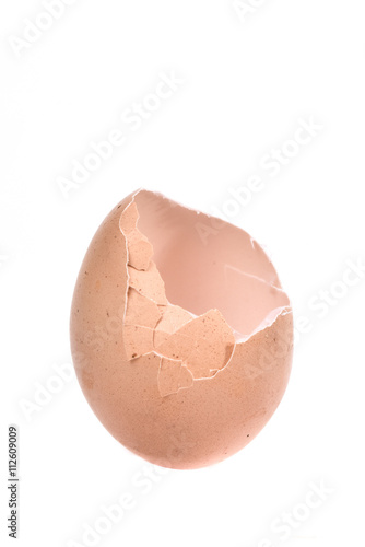 a cracked eggshell, broken eggshell on white background