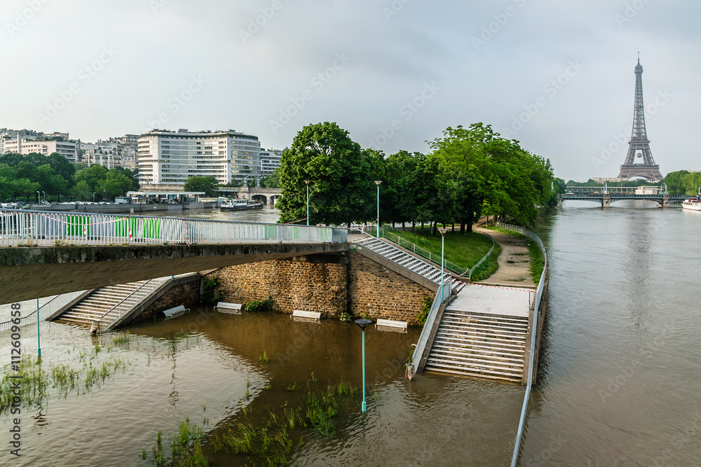 Flood in Paris: Ile aux Cygnes (Swans Island) embankment. France