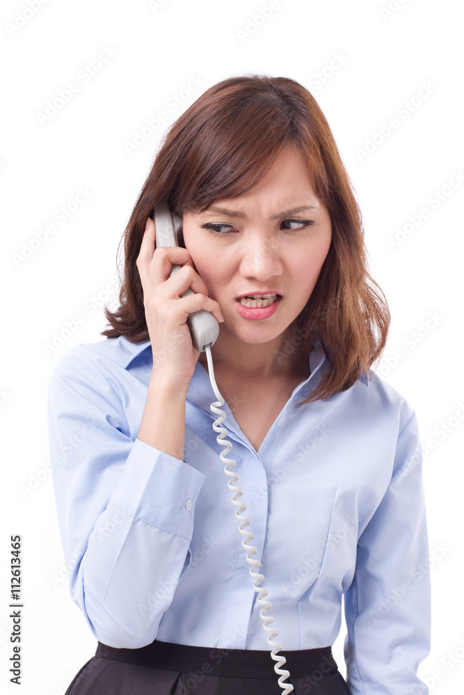 angry, frustrated, upset businesswoman on phone, studio shot of angry, frustrated, upset businesswoman on phone, studio shot of