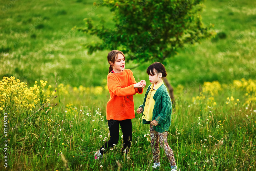 Fototapeta premium The children happy outdoors.