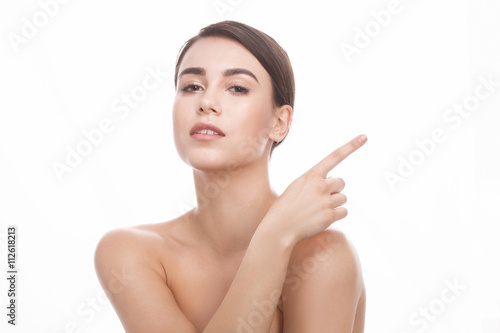 Closeup portrait of attractive and happy caucasian girl with beautiful smiling face isolated on white background. © Svyatoslav Lypynskyy