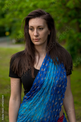 Photography Pretty brunette woman wearing  indian dress and scarf