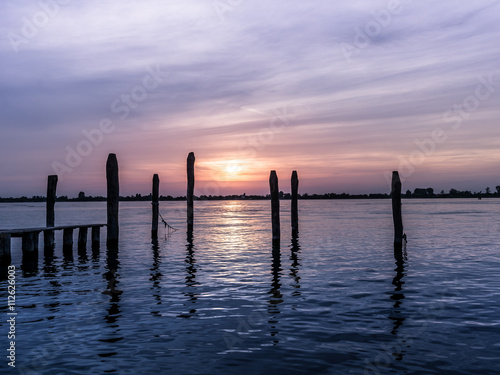 Violet sunset on blue water