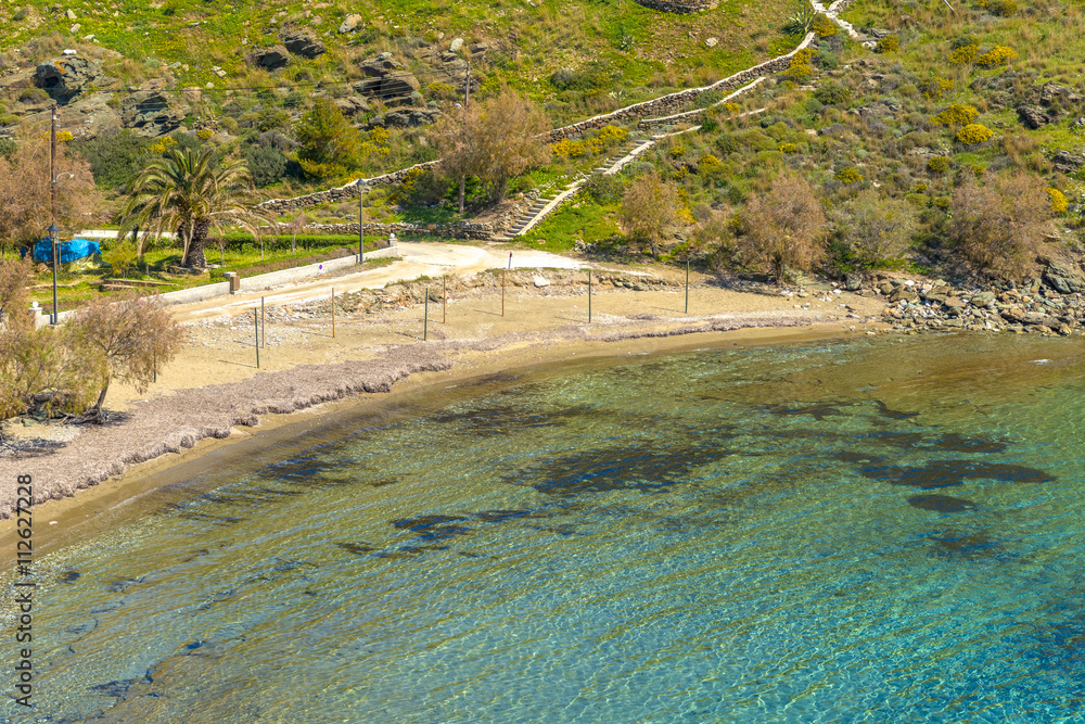 Beautiful sandy beach in Syros, Cyclades, Greece. Crystal clear