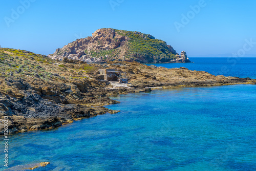 Fototapeta Naklejka Na Ścianę i Meble -  Rocky beach in Mykonos, Cyclades, Greece.
