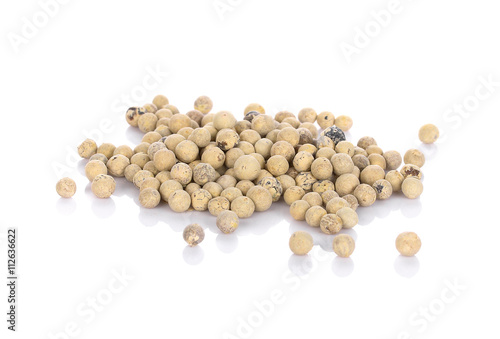 white peppers on the white background