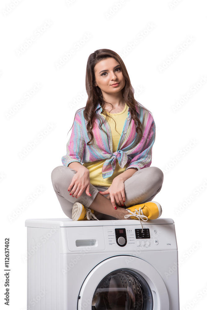 Woman tired after doing laundry isolated on white