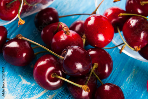 Cherry isolated on wood