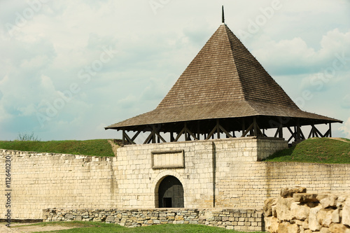 Medieval fortress in village photo