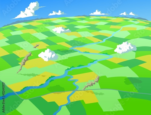 Aerial view of fields and crops, with fluffy white clouds