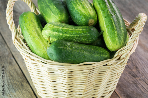 Farm organic cucumbers in basket.