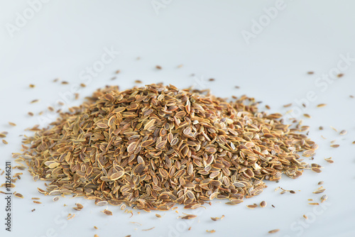 Dill seed on white background