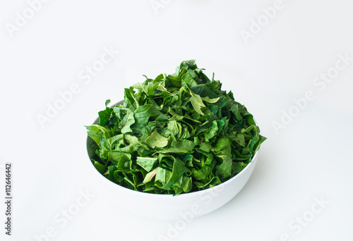 Fresh spinach isolated on white