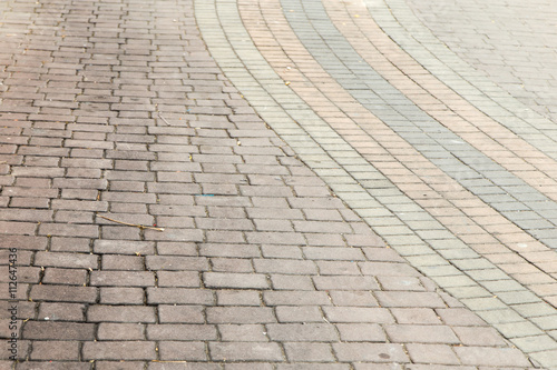 Floor pavers in a path, detail of a pavement to walk, textured background 