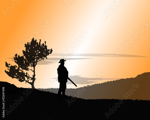 silhouette of a hunter. concept background. © franz12