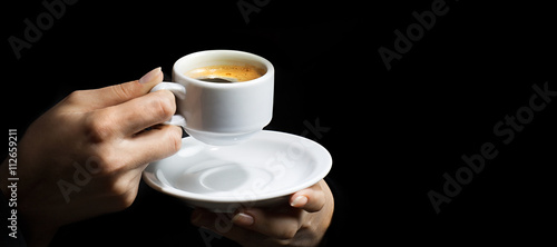 Woman s Hands holding a cup of coffee
