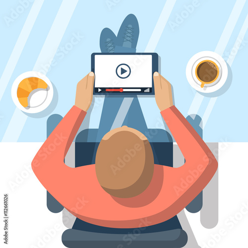 Man holding video player
