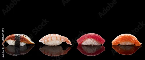 Panel kuchenny z motywem Sushi nigiri over black background