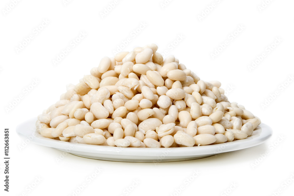 Hill of Beans – Navy beans piled high on a white plate. White background. Hill of Beans – Navy beans piled high on a white plate. White background.